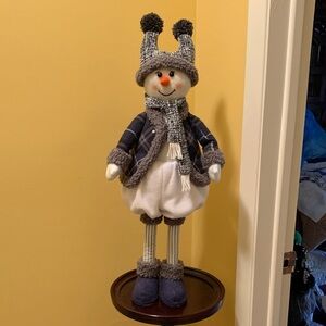 Charming Snowman Holiday Decor with Blue and Gray Outfit